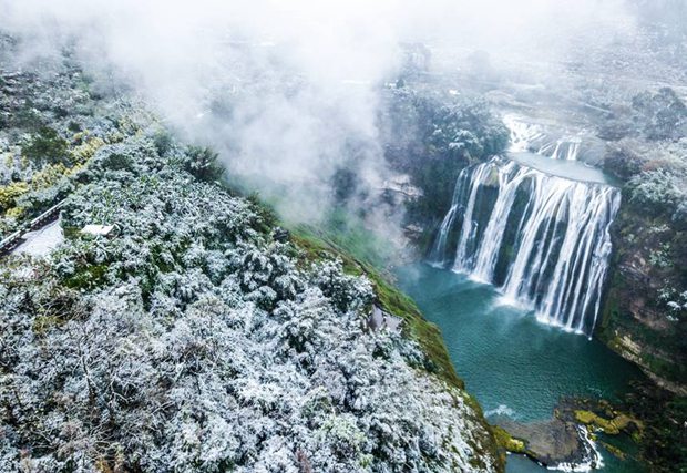 Huangguoshu Waterfall transformed into misty wonderland in SW China