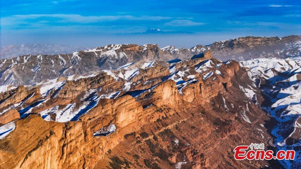 Snow-covered Danxia landform in Xinjiang