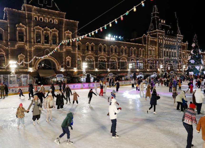 People skate on GUM ice rink at Red Square in Moscow