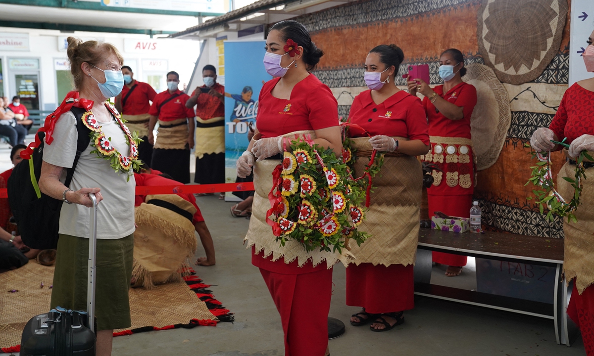 ‘Good to be back’: hugs and tears as Tonga reopens borders after it lifts restricti