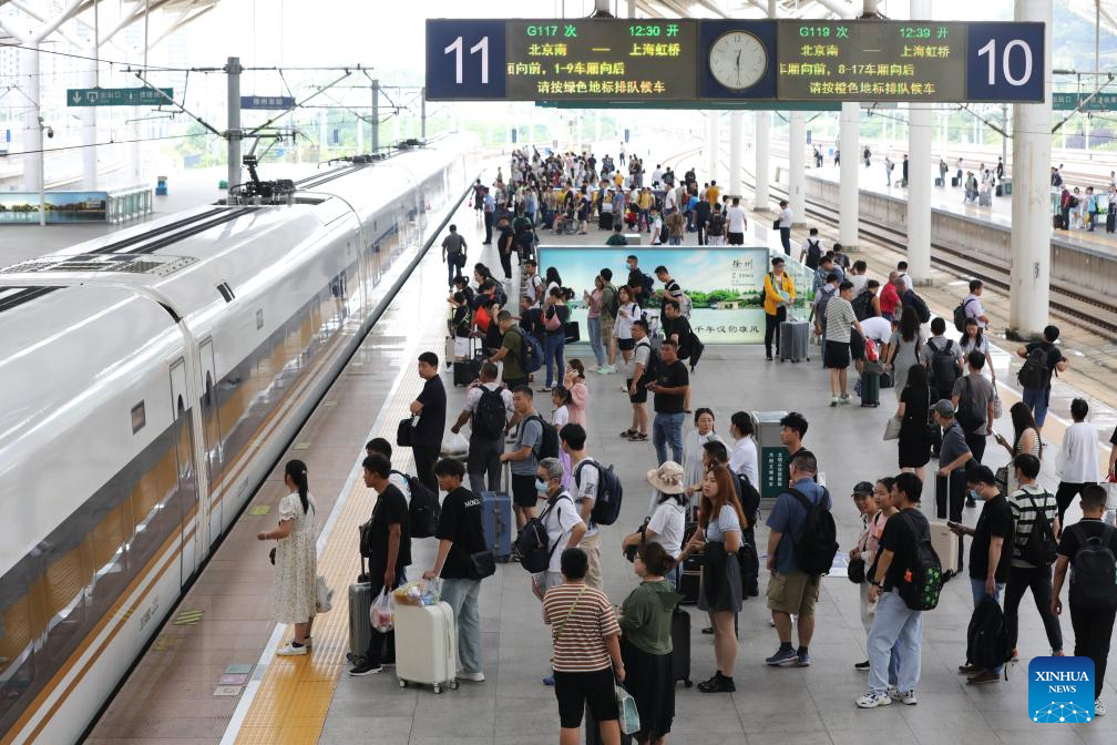 Chinese railways report 406 mln passenger trips in July