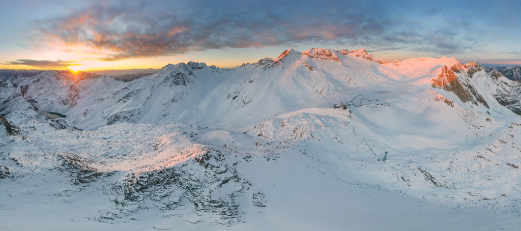 Snow-covered Dagu Glacier basks in sunset in SW China